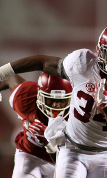Hurts, Alabama defense lead way in 49-30 win over Arkansas
